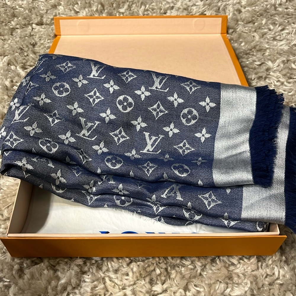 Like new monogram denim shawl.  Worn once.  Excellent condition.